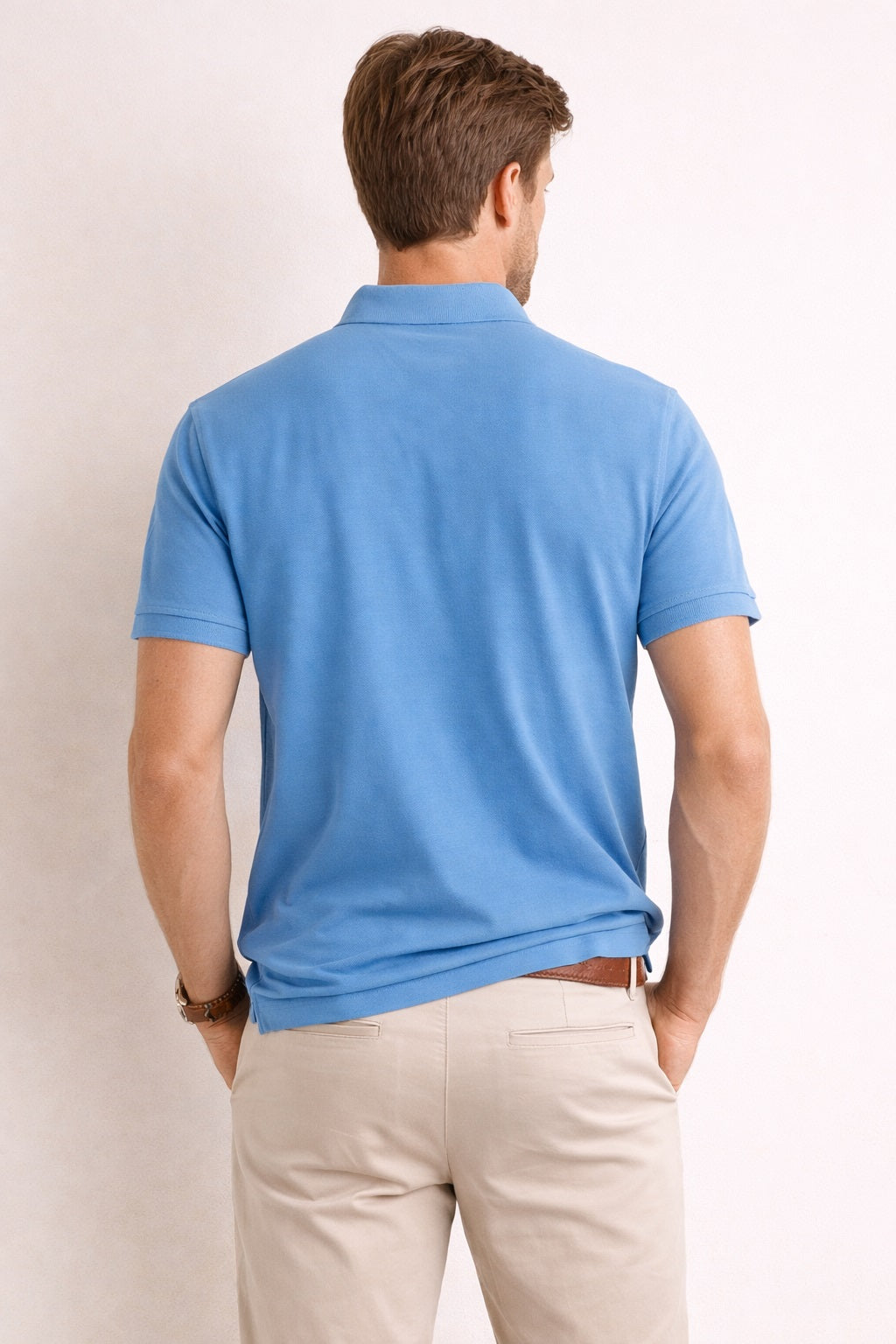 Back view of Dare Wolf solid blue polo t-shirt
