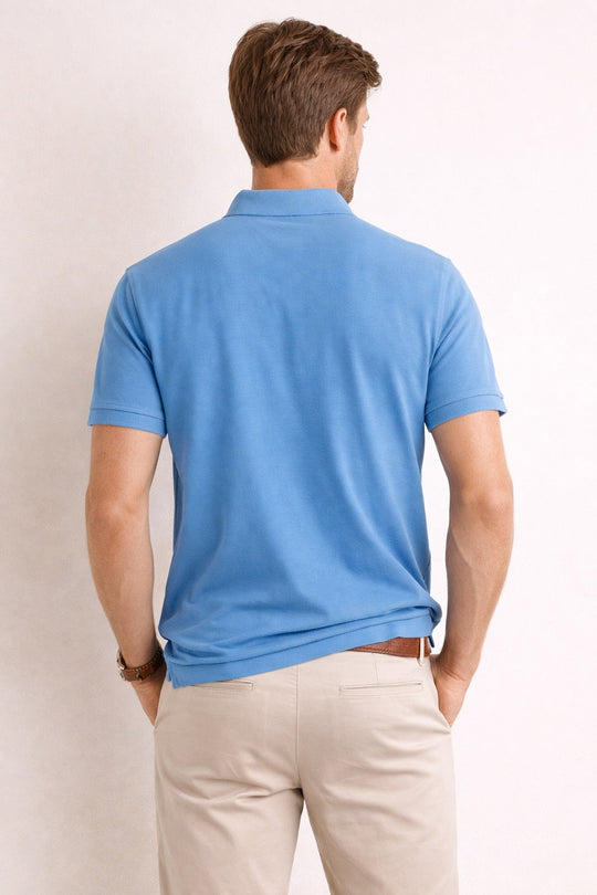 Back view of Dare Wolf solid blue polo t-shirt