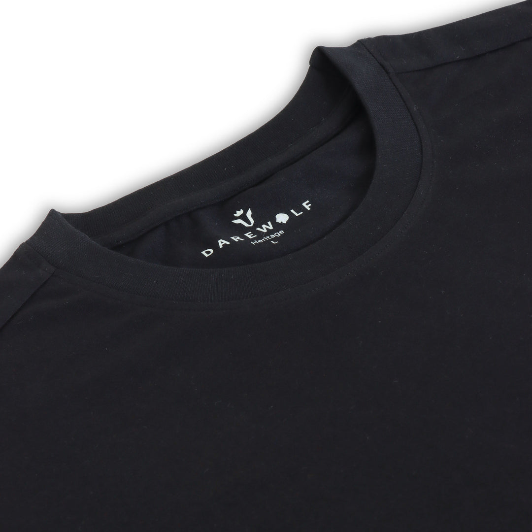 Close-up detail of Dare Wolf black round neck t-shirt fabric