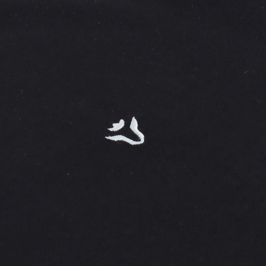 Close-up detail of Dare Wolf black round neck t-shirt collar