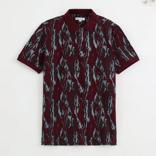 Detail view of maroon abstract print polo t-shirt fabric
