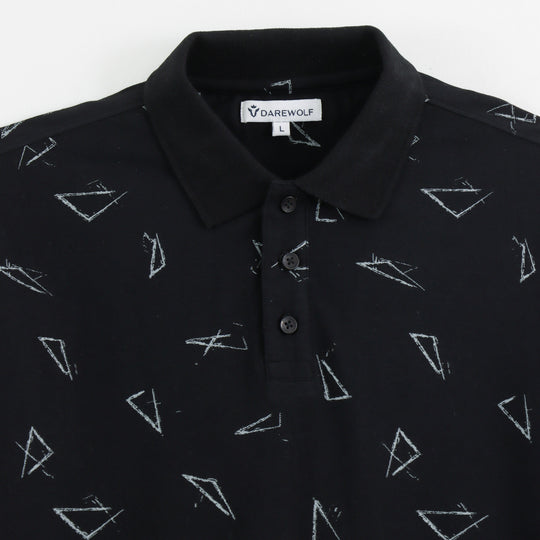Close-up detail of Dare Wolf black geometric polo t-shirt sleeve