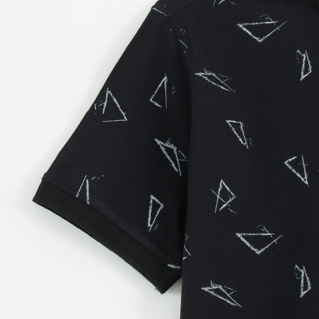 Close-up detail of Dare Wolf black geometric polo t-shirt fabric texture
