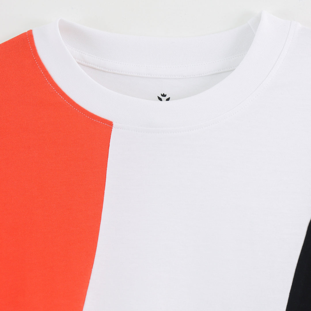 Close-up detail of Dare Wolf orange diagonal round neck t-shirt panel design