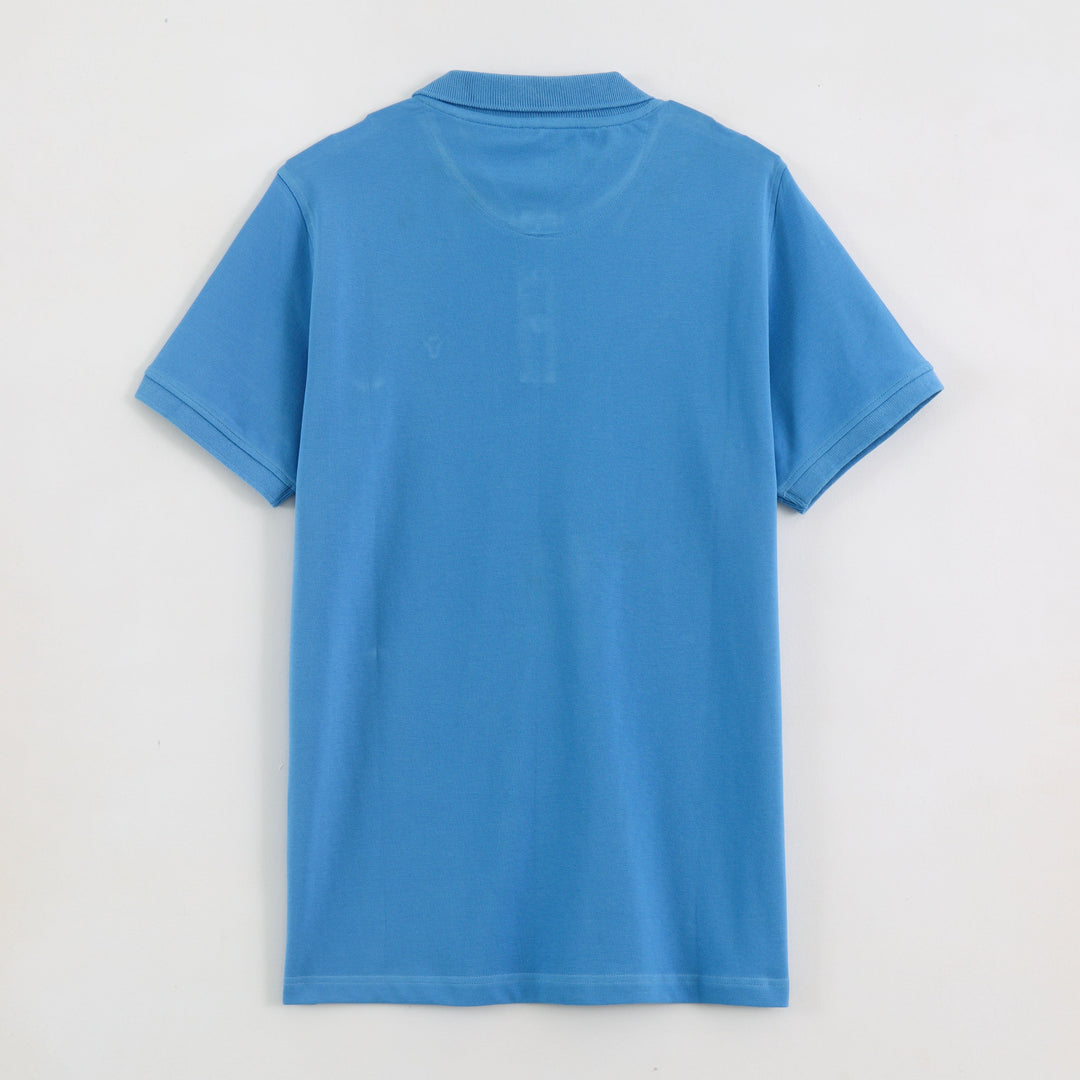 Close-up detail of Dare Wolf blue polo t-shirt sleeve