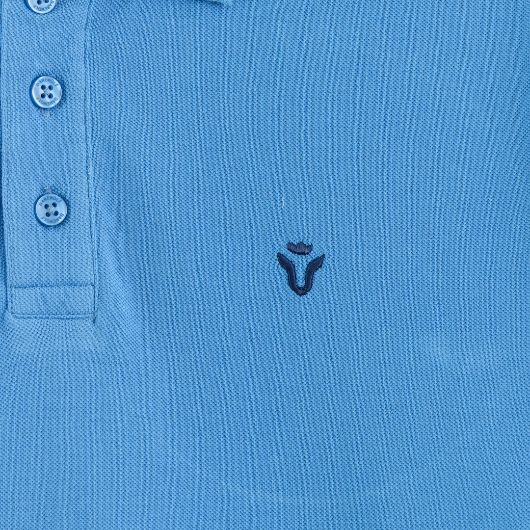 Close-up detail of Dare Wolf blue polo t-shirt fabric texture
