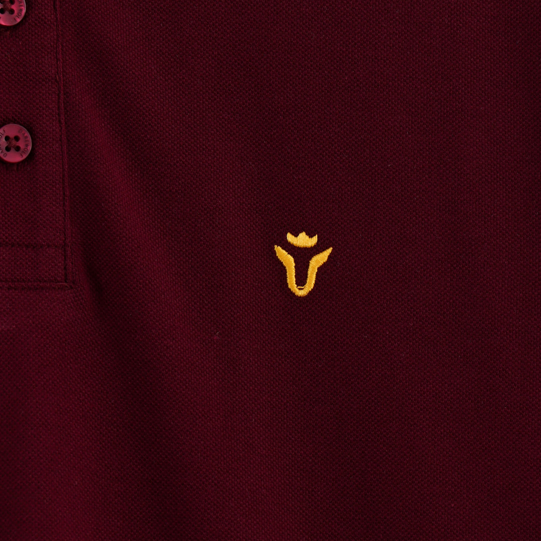 Close-up detail of Dare Wolf maroon polo t-shirt collar