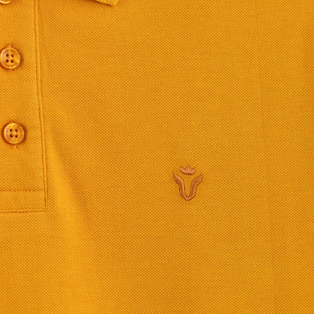 Close-up detail of Dare Wolf yellow polo t-shirt collar