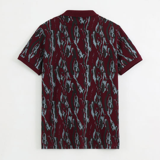 Close-up detail of Dare Wolf maroon abstract polo t-shirt collar