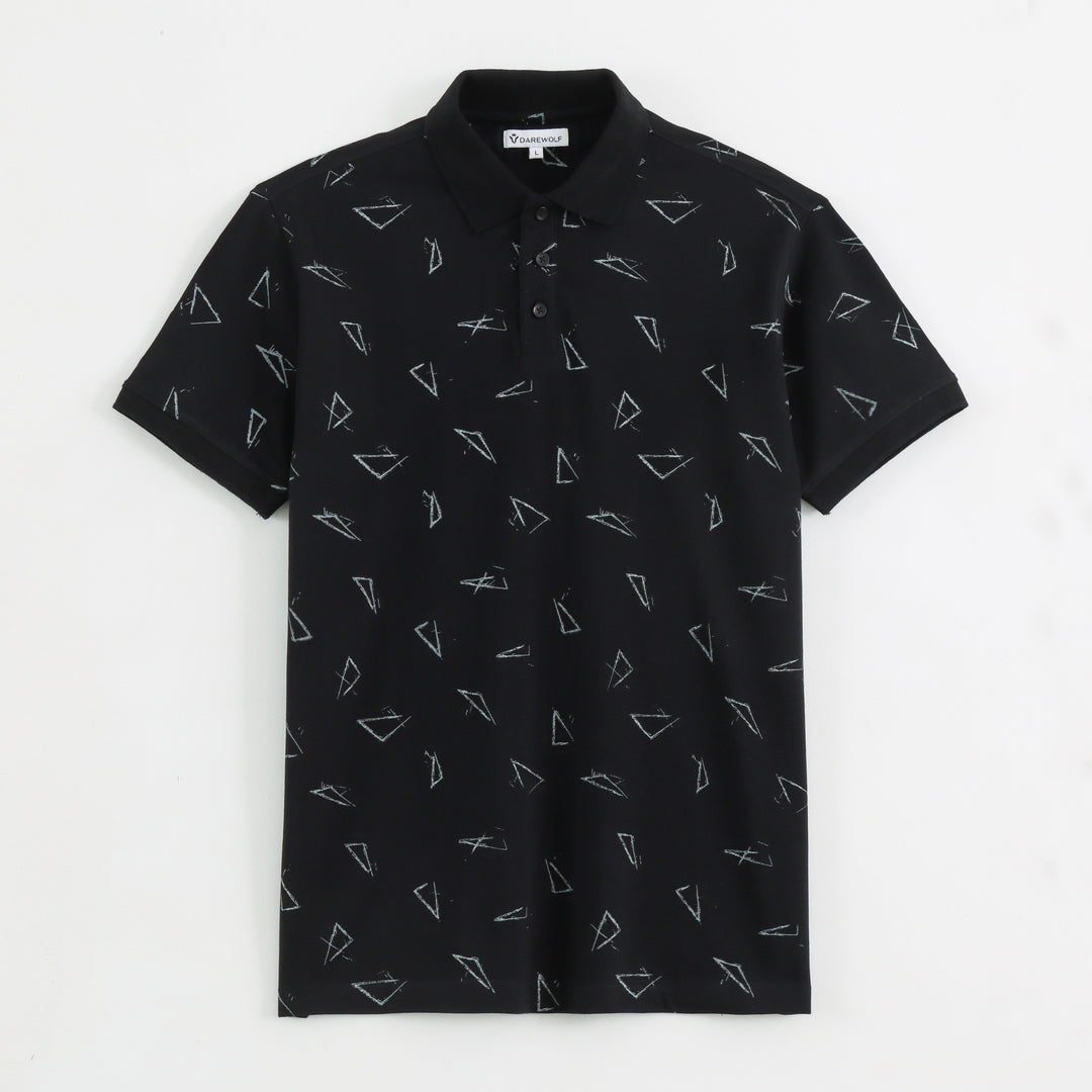 Detail view of black geometric all-over print polo t-shirt fabric