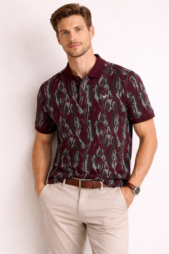 Front view of Dare Wolf maroon all-over print polo t-shirt with abstract grey and black pattern