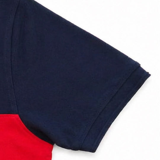 Close-up of sleeve detail on black and red cut & sew polo t-shirt